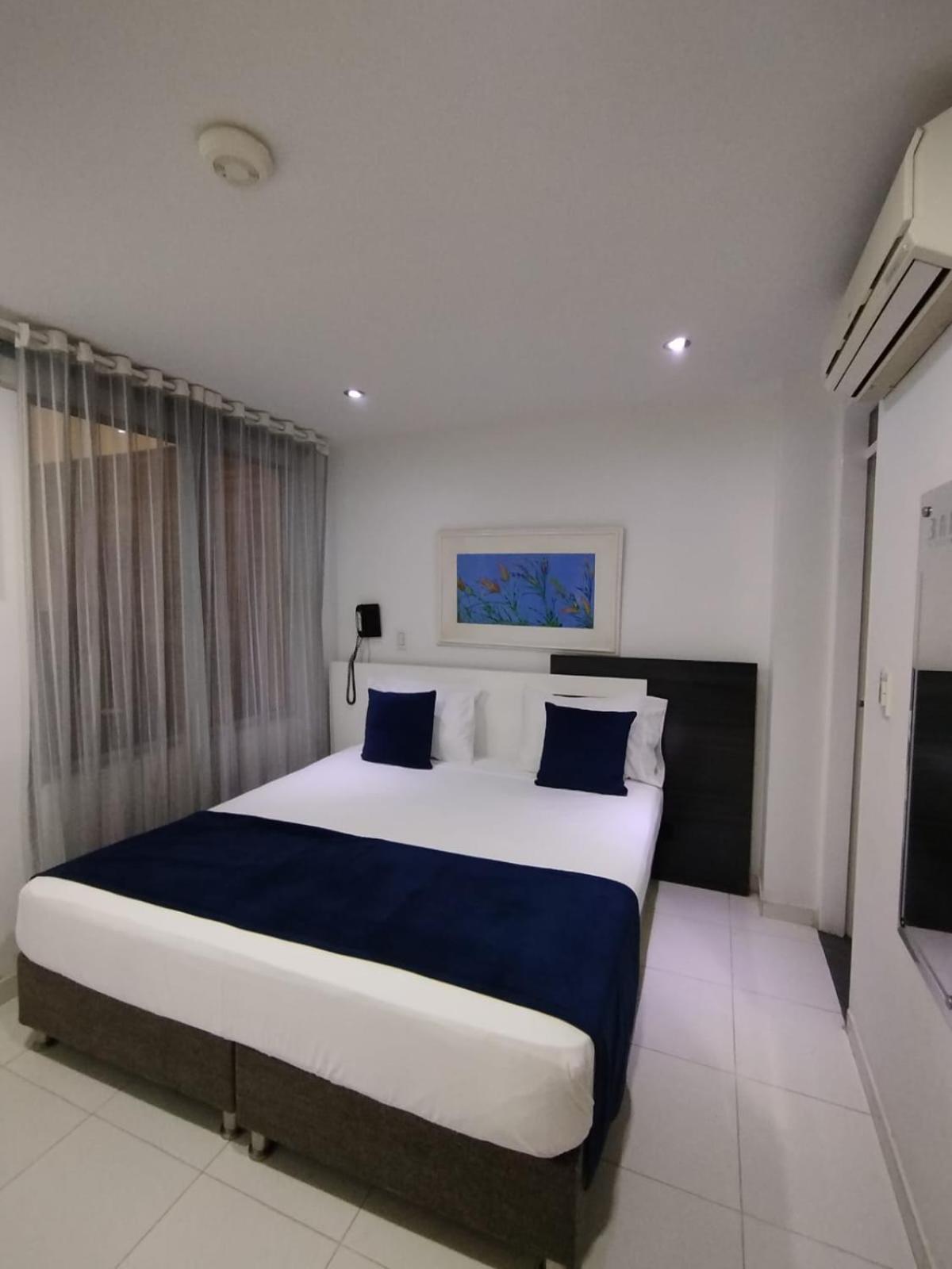 Hotel Bahia Villavicencio Quarto foto